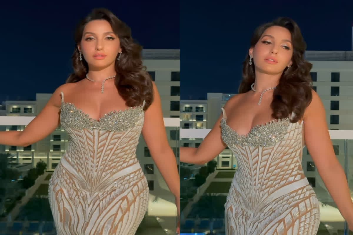 Nora Fatehi Sexy Video: पंख वाली व्हाइट ड्रेस में डांसिंग क्वीन ने बिखेरा हुस्न का जलवा, कर्वी फिगर देख अटकी फैंस की निगाहें