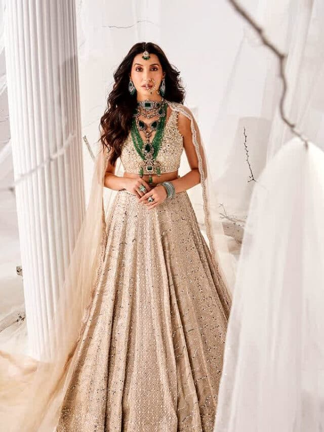 Nora Fatehi Traditional Look: हैवी कढ़ाई वर्क वाले लहंगा-ब्लाउज सेट में नोरा फतेही ने दिखाया गजब का नूर
