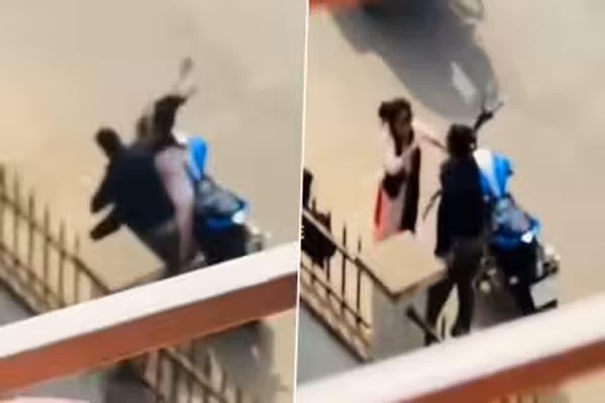 Couple Fighting Viral Video: बीच सड़क पर कपल के बीच हुई जमकर मारपीट, वीडियो देख आप भी हो जाएंगे हैरान