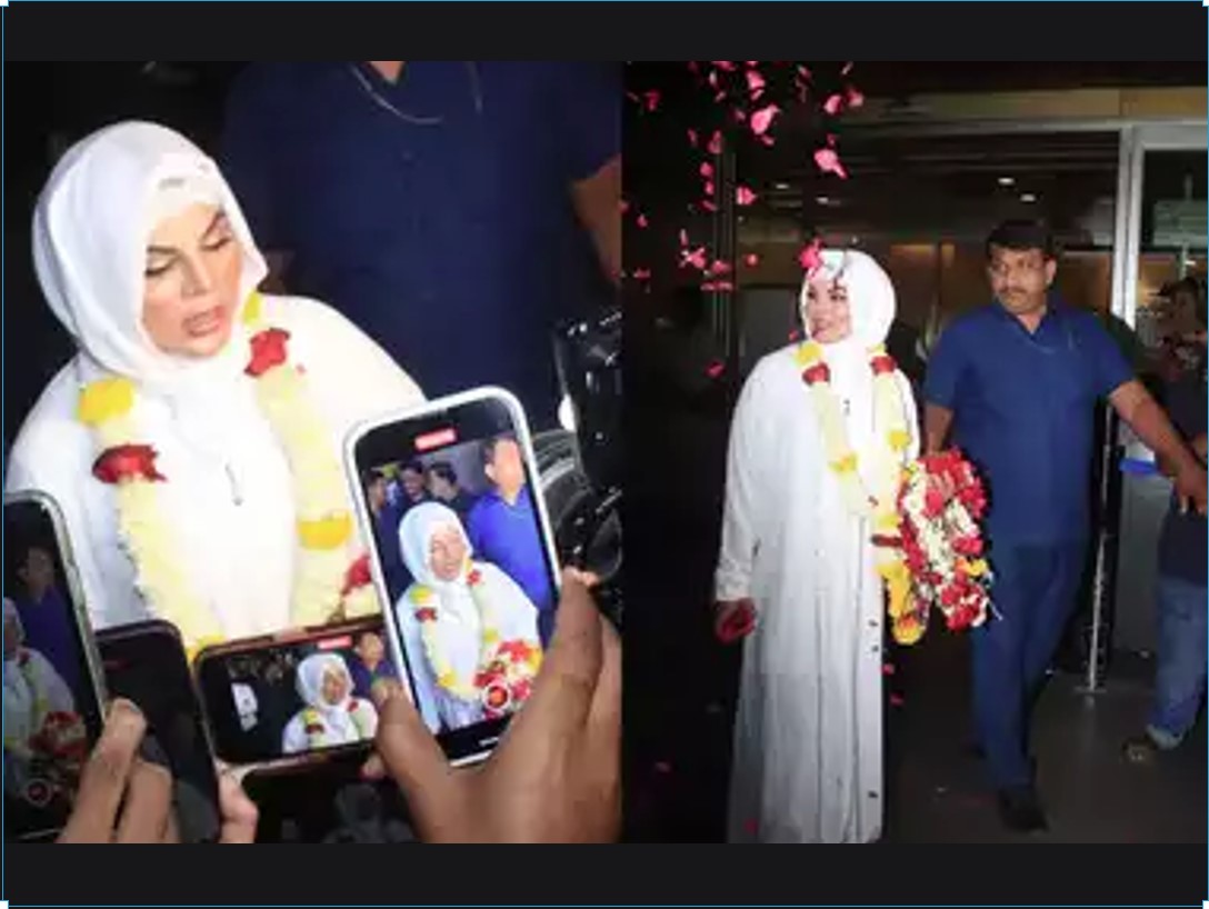 Bollywood news : मदीना से उमराह कर लौटीं राखी सावंत ने कहा खुदको फातिमा , एयरपोर्ट पर फूल-मालाओं के साथ ट्रोलिंग की बरसात