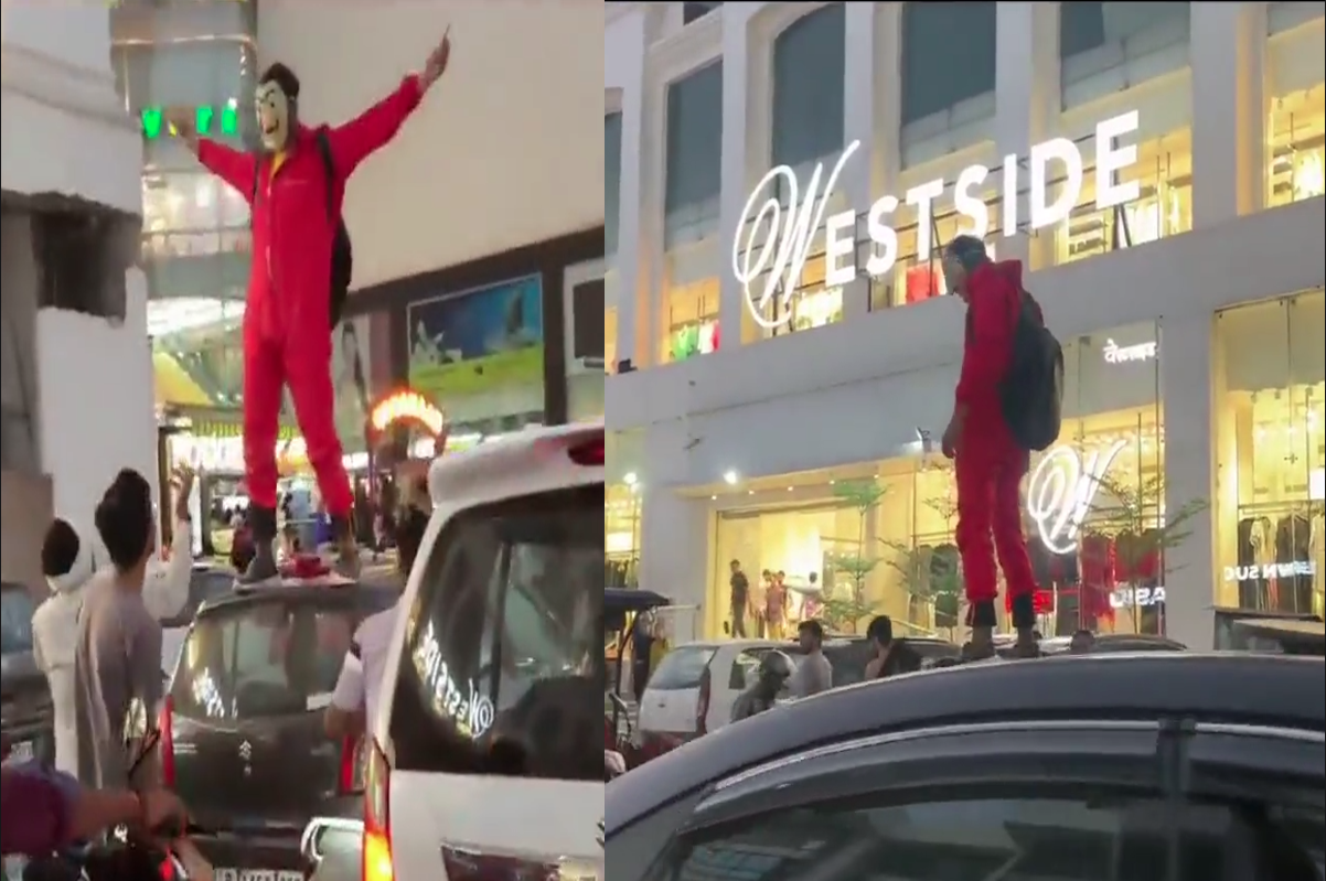 Real Money Heist Jaipur Video: सड़क पर मनी हाइस्ट, गाड़ी के उपर खड़े होकर युवक ने की पैसों की बरसात